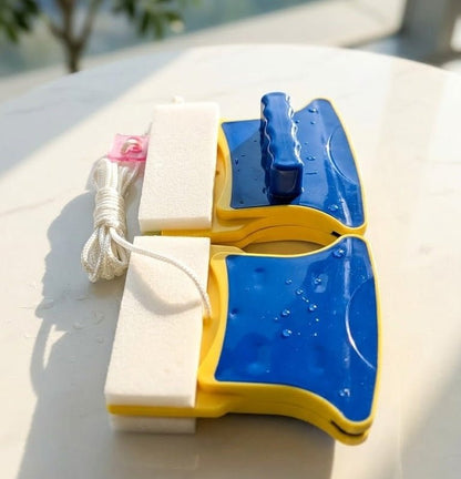 Double-Sided Magnetic Glass Cleaner cleaning a window